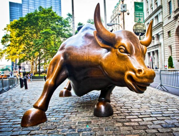 NEW YORK CITY - AUG 3: The landmark Charging Bull in Lower Manhattan represents aggressive financial optimism and prosperity August 3, 2012 in New York, NY. Breaking Down the Wall: How One Bill Could Finally Open Investment Doors Shut for Decades